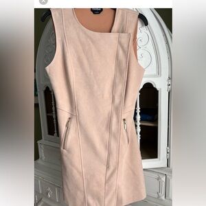 NEW Faux suede stunning dress with  asymmetrical front zipper.. Size small.